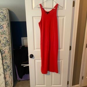 Melon colored ribbed tank dress. Never worn. Side slit. Knee length